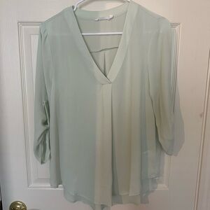 Lush light green long sleeved blouse